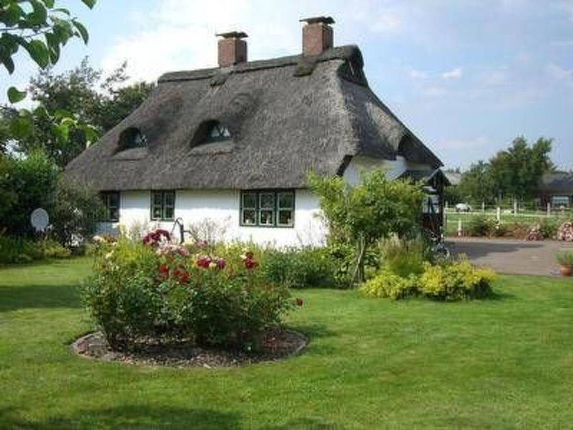 Reetdach Ferienhaus in Helserdeich bei Marne und Friedrichskoog - Nordsee Nordseeferien mit der Familie